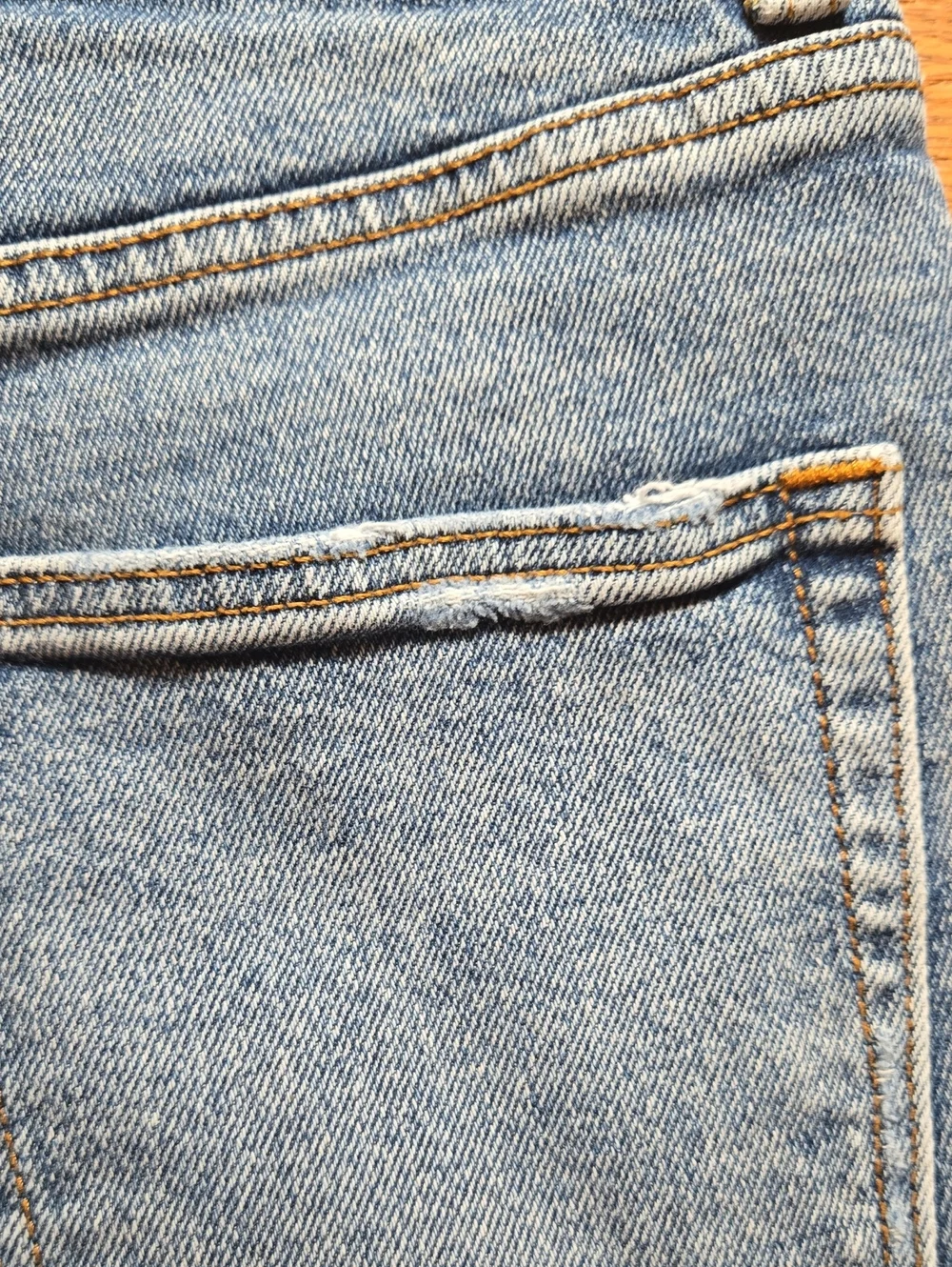 Faherty Indigo Dyed light distress high rise denim cutoff shorts